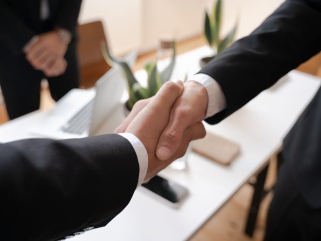 negotiation and shaking hands